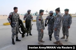 Военнослужащие иранского флота участвуют в совместных военно-морских учениях иранского, китайского и российского флотов в северной части Индийского океана, 20 января 2022 года. Фото West Asia News Agency/Reuters