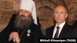 Путин с митрополитом Павлом, епископом УПЦ Московского Патриархата, митрополитом Вышгородским и Чернобыльским